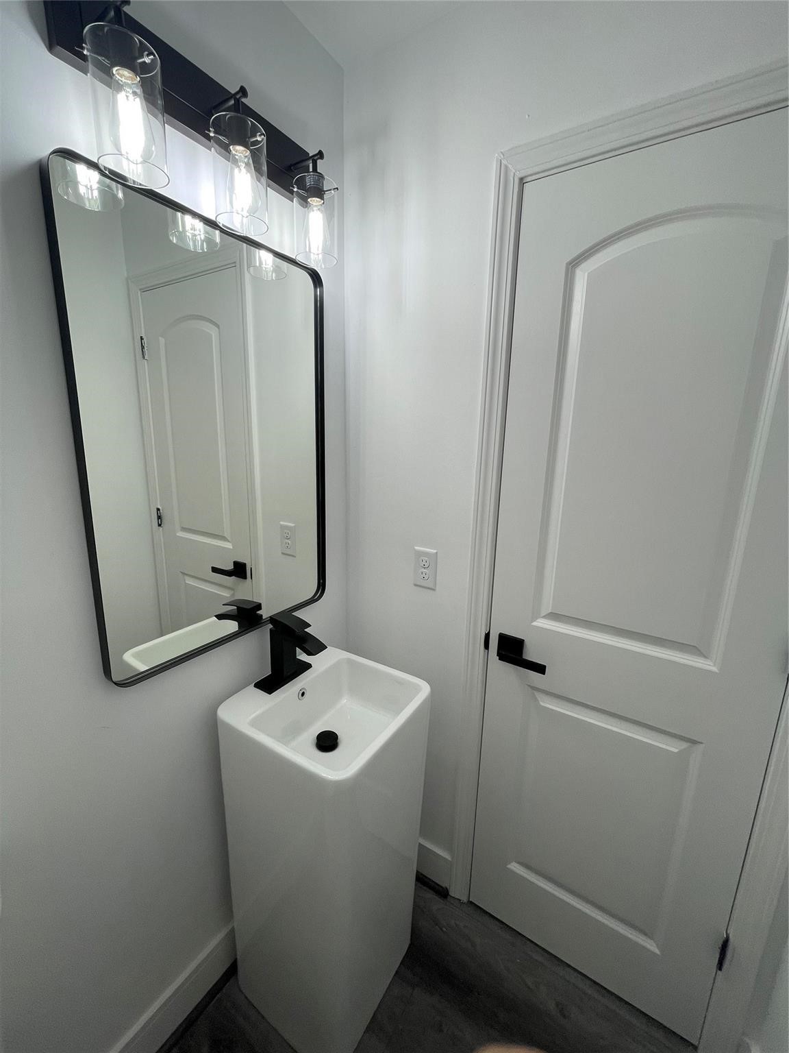 5821 Lantern Drive Beaumont, TX 77713 - Photo 17 of 17 a bathroom with a sink and mirror