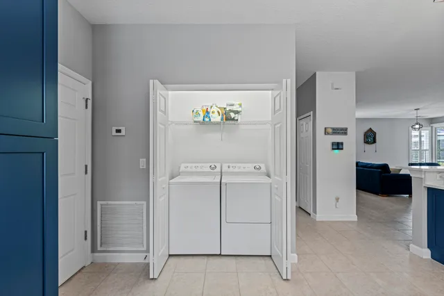 a view of a porch with furniture and yard