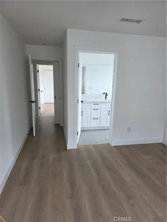 a view of a kitchen with a sink