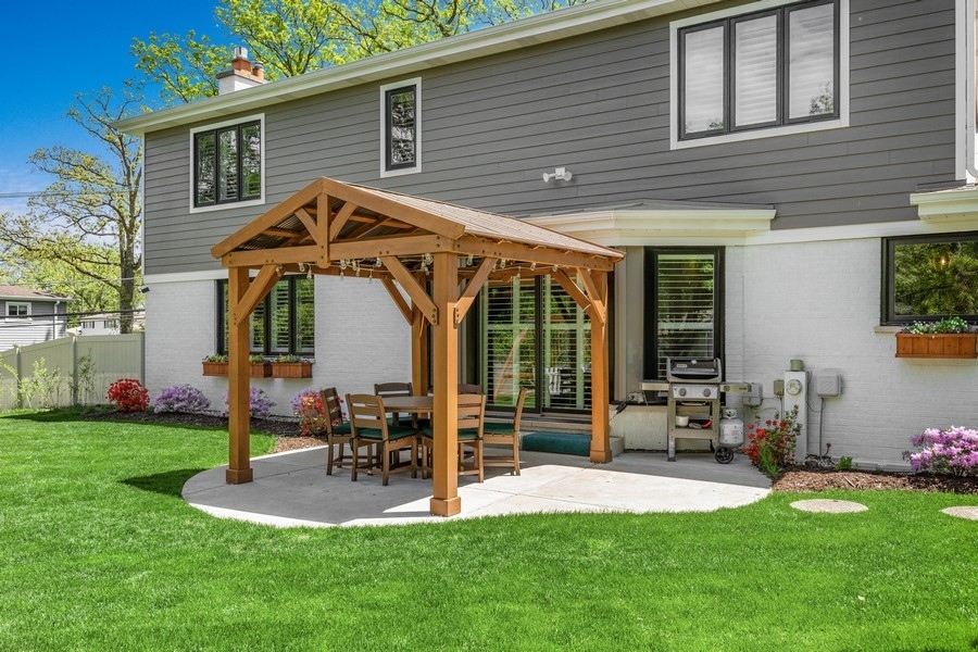 3900 Rugen Road Glenview, IL 60025 - Photo 12 of 44 a view of a house with backyard