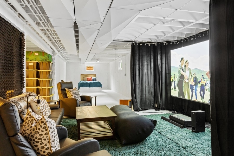 3900 Rugen Road Glenview, IL 60025 - Photo 31 of 44 a living room with furniture and a flat screen tv