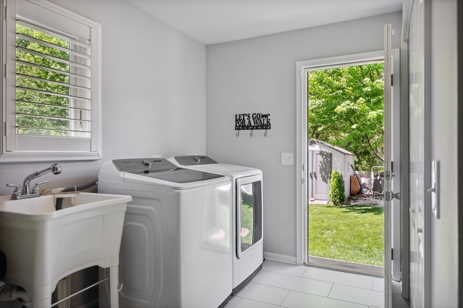 3900 Rugen Road Glenview, IL 60025 - Photo 34 of 44 a utility room with dryer and washer