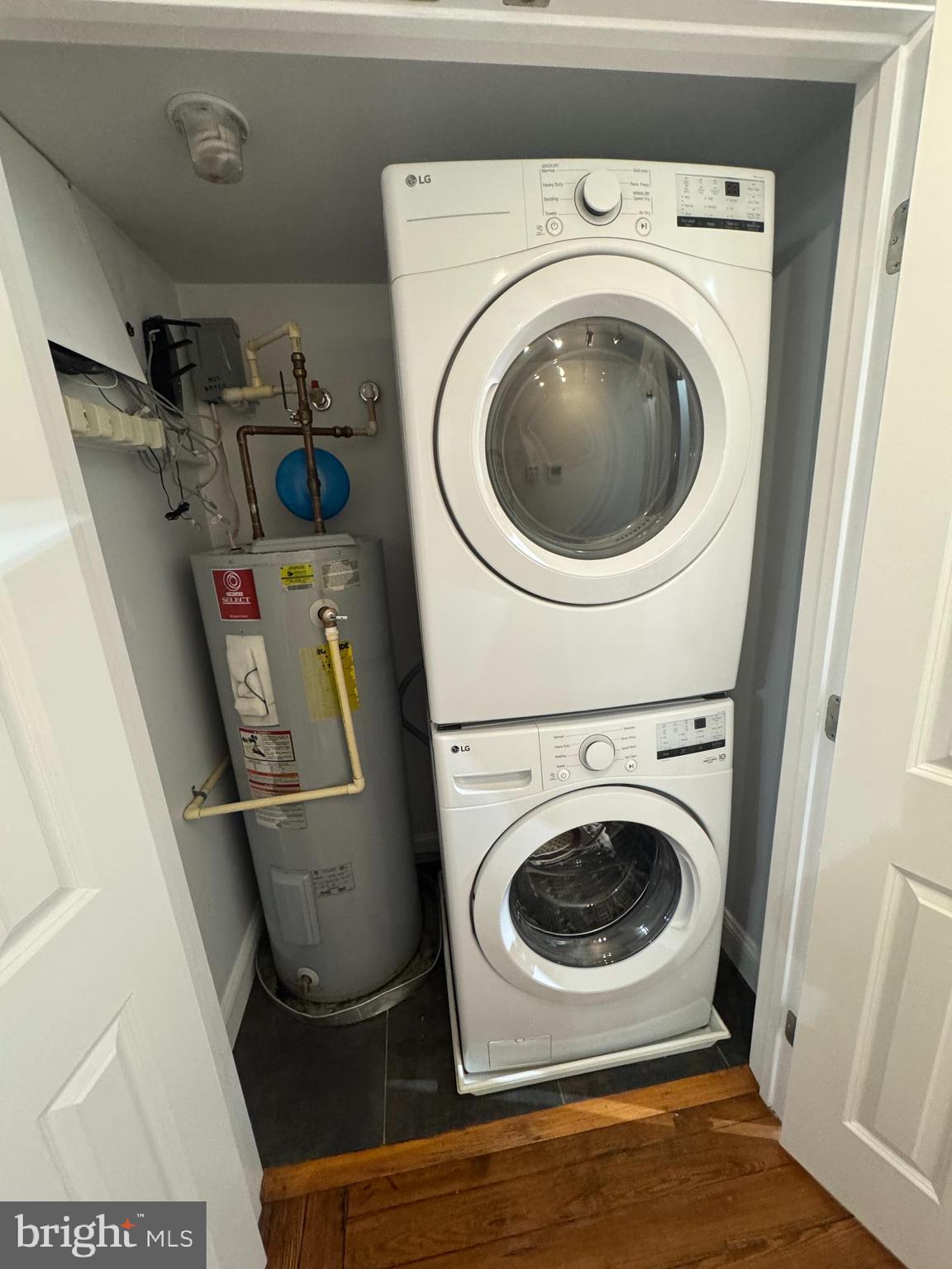 1029 St Paul Street Baltimore, MD 21202 - Photo 7 of 10 a utility room with dryer and washer