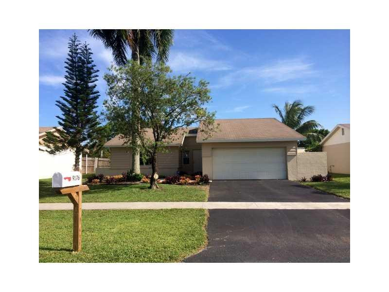 9176 Affirmed Lane Boca Raton, FL 33496 - Photo 1 of 24 Exterior Front