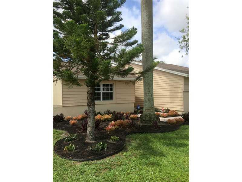 9176 Affirmed Lane Boca Raton, FL 33496 - Photo 2 of 24 Exterior Front