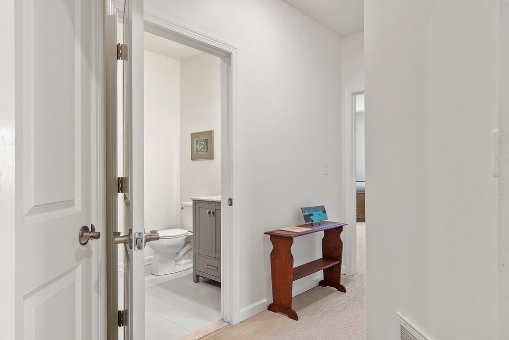62 Abigail Way, Unit 3004 Reading, MA 01867 - Photo 25 of 37 a living room with furniture