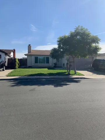 a house view with a outdoor space