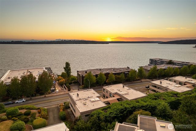 a view of a terrace with a lake view