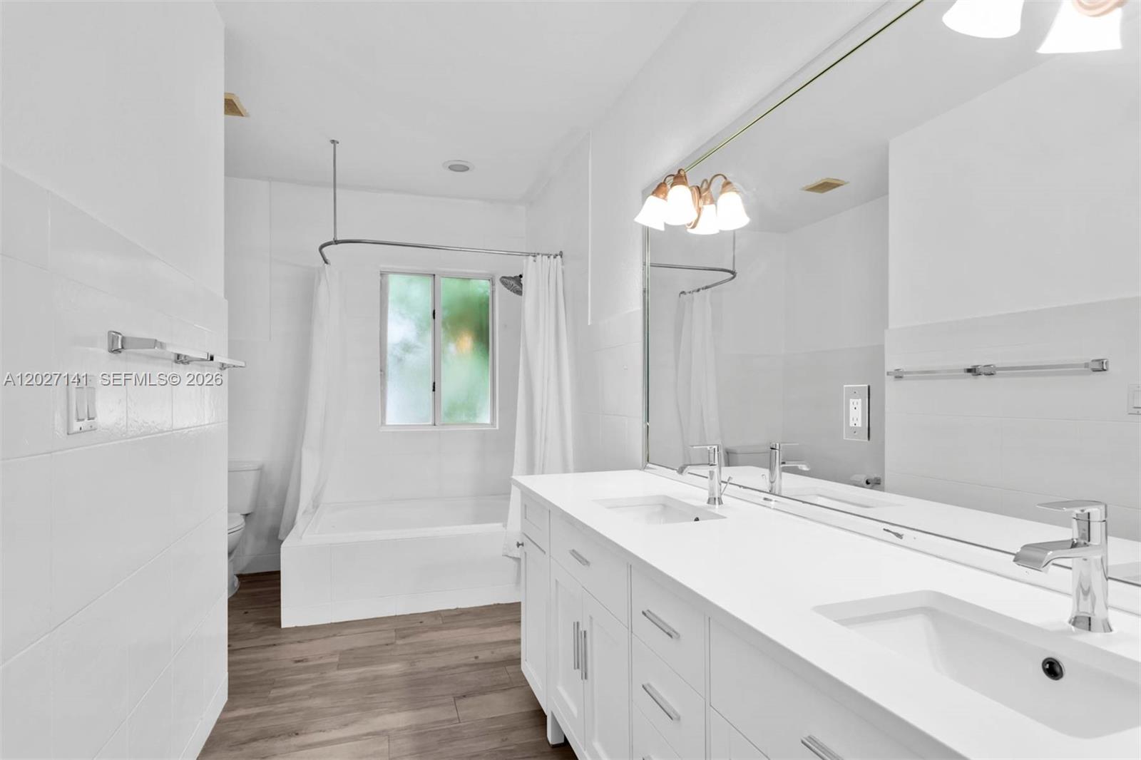 3062 Matilda Street, Unit 2 Miami, FL 33133 - Photo 17 of 32 Large bath with double sink and bath/tub shower
