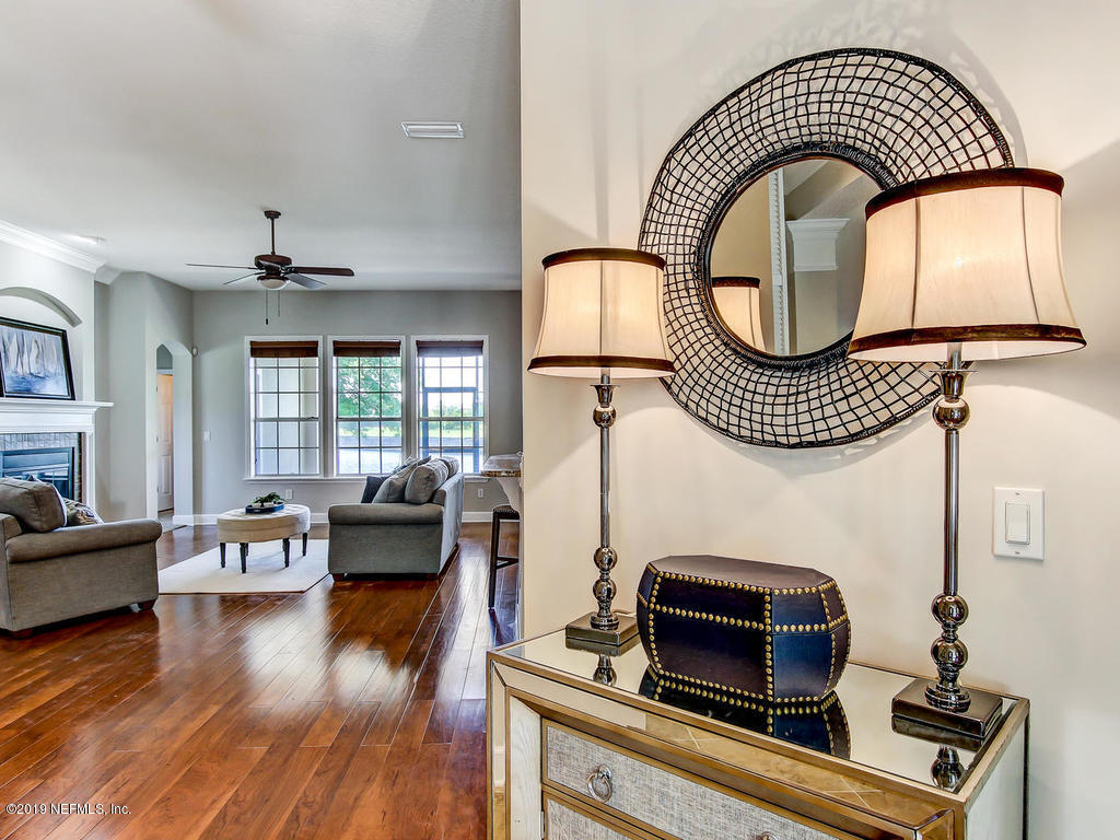 1780 North Loop Parkway St. Augustine, FL 32095 - Photo 12 of 98 a living room with furniture a rug and a window