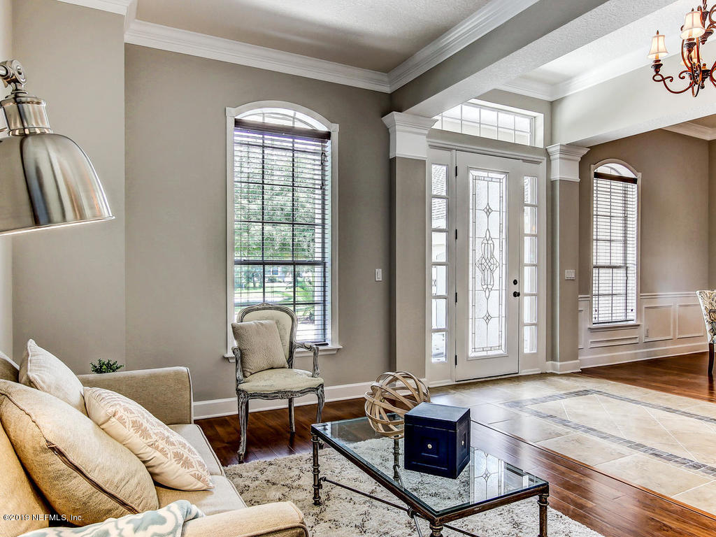 1780 North Loop Parkway St. Augustine, FL 32095 - Photo 18 of 98 a living room with furniture and a window