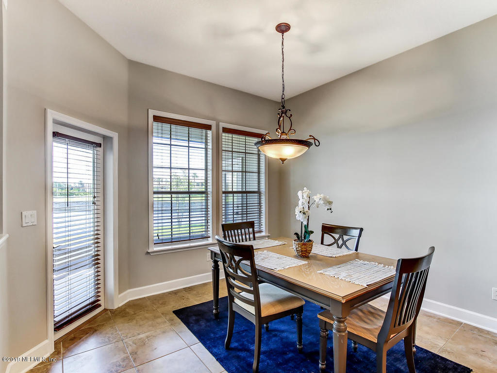 1780 North Loop Parkway St. Augustine, FL 32095 - Photo 27 of 98 a view of a dining room with furniture window and outside view