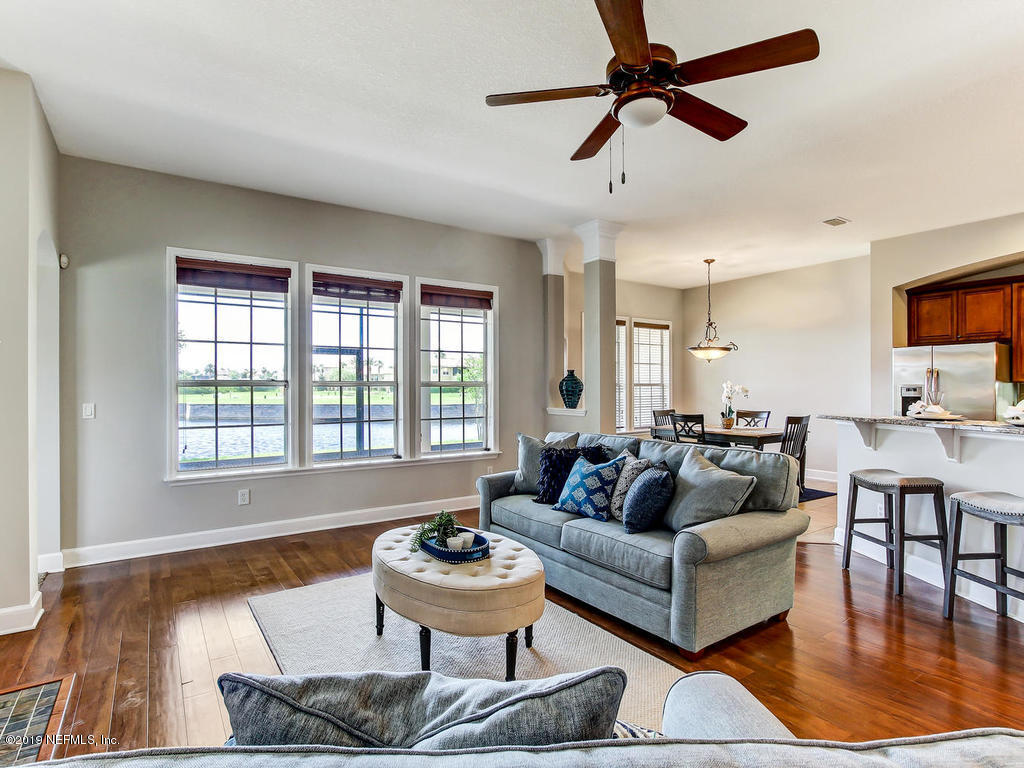1780 North Loop Parkway St. Augustine, FL 32095 - Photo 30 of 98 a living room with furniture and a large window