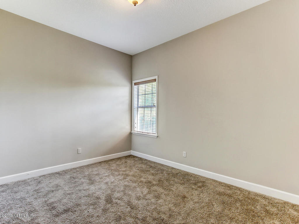 1780 North Loop Parkway St. Augustine, FL 32095 - Photo 46 of 98 an empty room with a window