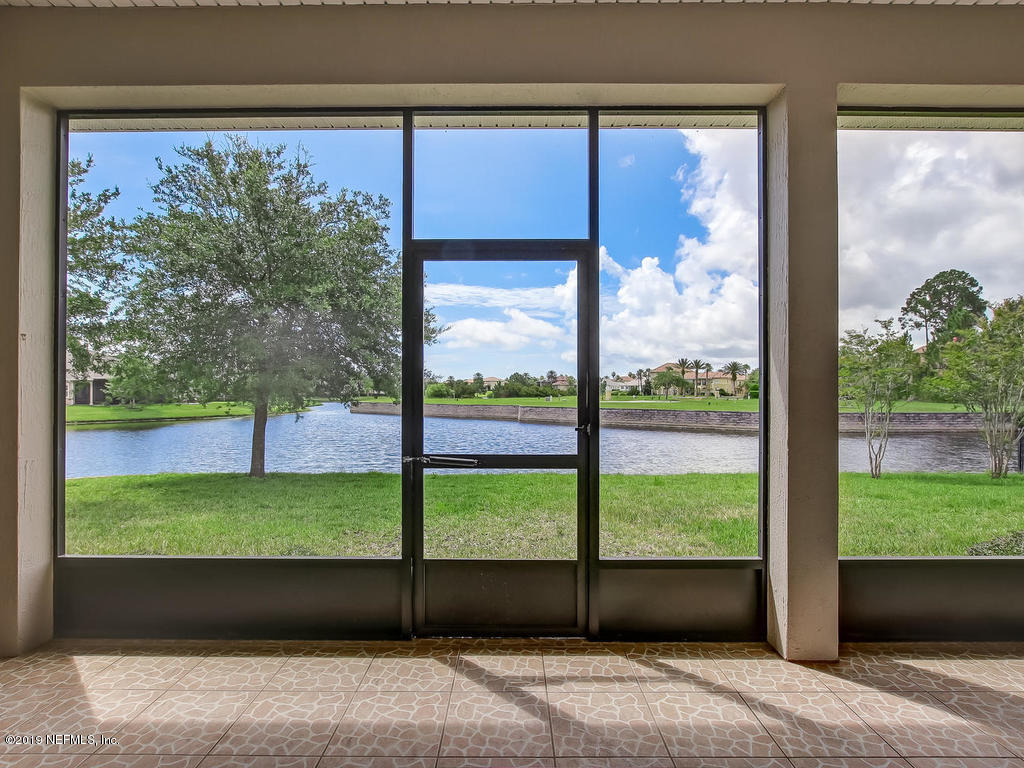 1780 North Loop Parkway St. Augustine, FL 32095 - Photo 54 of 98 a view of a back yard from a big room