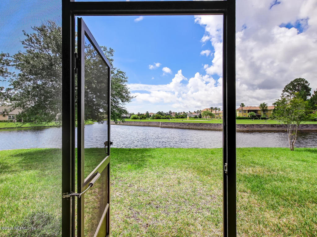 1780 North Loop Parkway St. Augustine, FL 32095 - Photo 56 of 98 a view of a porch with a yard