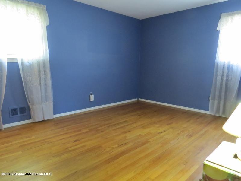 200 Bethany Road Hazlet, NJ 07730 - Photo 13 of 22 a view of empty room with wooden floor