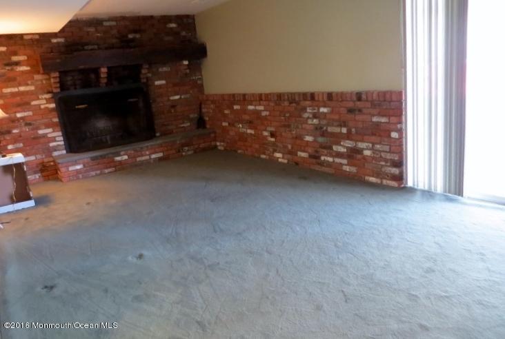 200 Bethany Road Hazlet, NJ 07730 - Photo 15 of 22 a bedroom with a bed and a dresser