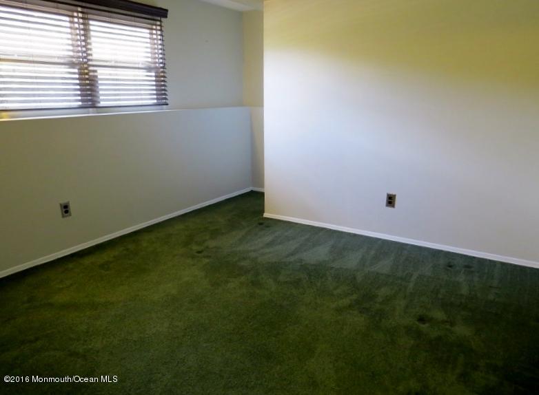 200 Bethany Road Hazlet, NJ 07730 - Photo 16 of 22 a view of an empty room with a window