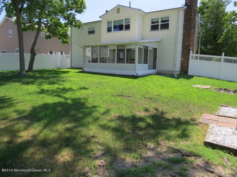 200 Bethany Road Hazlet, NJ 07730 - Photo 20 of 22 a view of a house with a yard