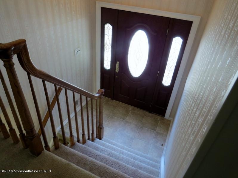 200 Bethany Road Hazlet, NJ 07730 - Photo 4 of 22 a view of staircase with wooden floor