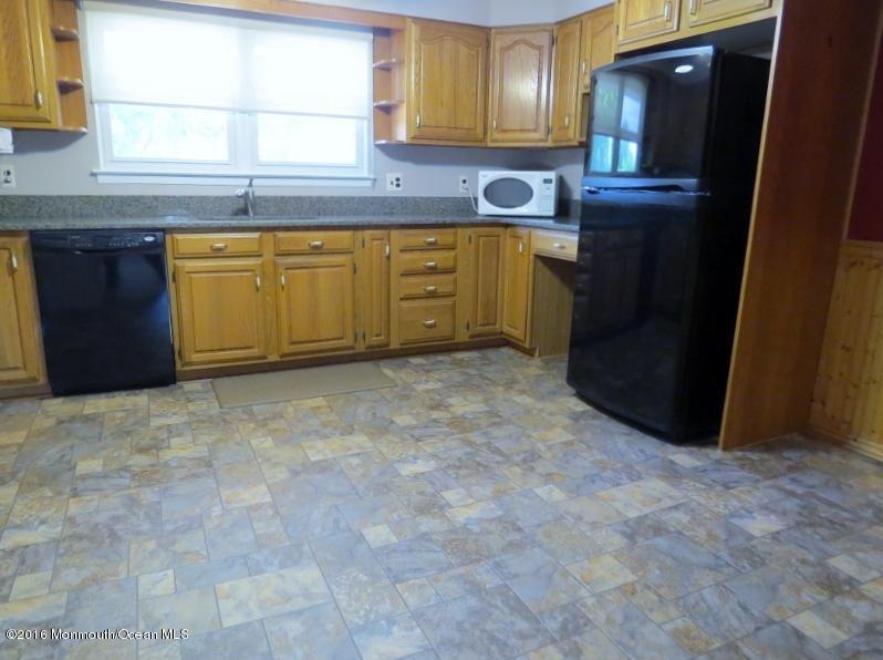 200 Bethany Road Hazlet, NJ 07730 - Photo 5 of 22 a kitchen with stainless steel appliances granite countertop a refrigerator and a sink