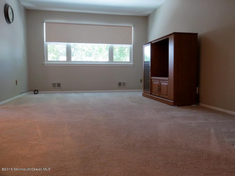 200 Bethany Road Hazlet, NJ 07730 - Photo 9 of 22 an empty room with windows and closet