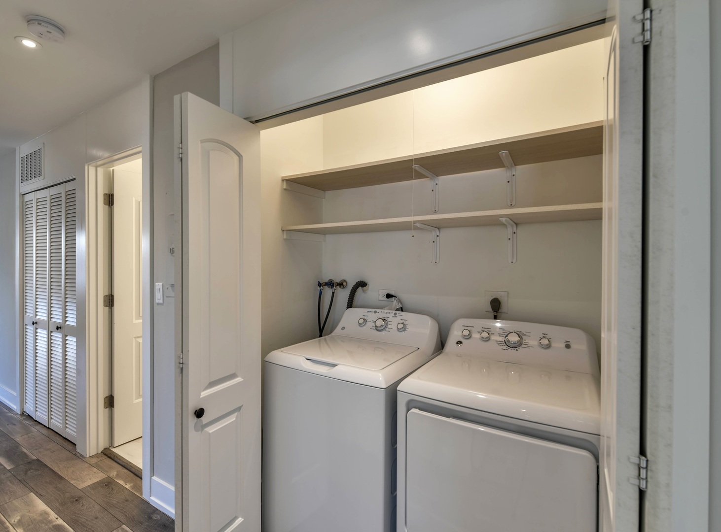 787 Pahl Road, Unit 787 Elk Grove Village, IL 60007 - Photo 24 of 28 a view of storage and utility room with washer and dryer