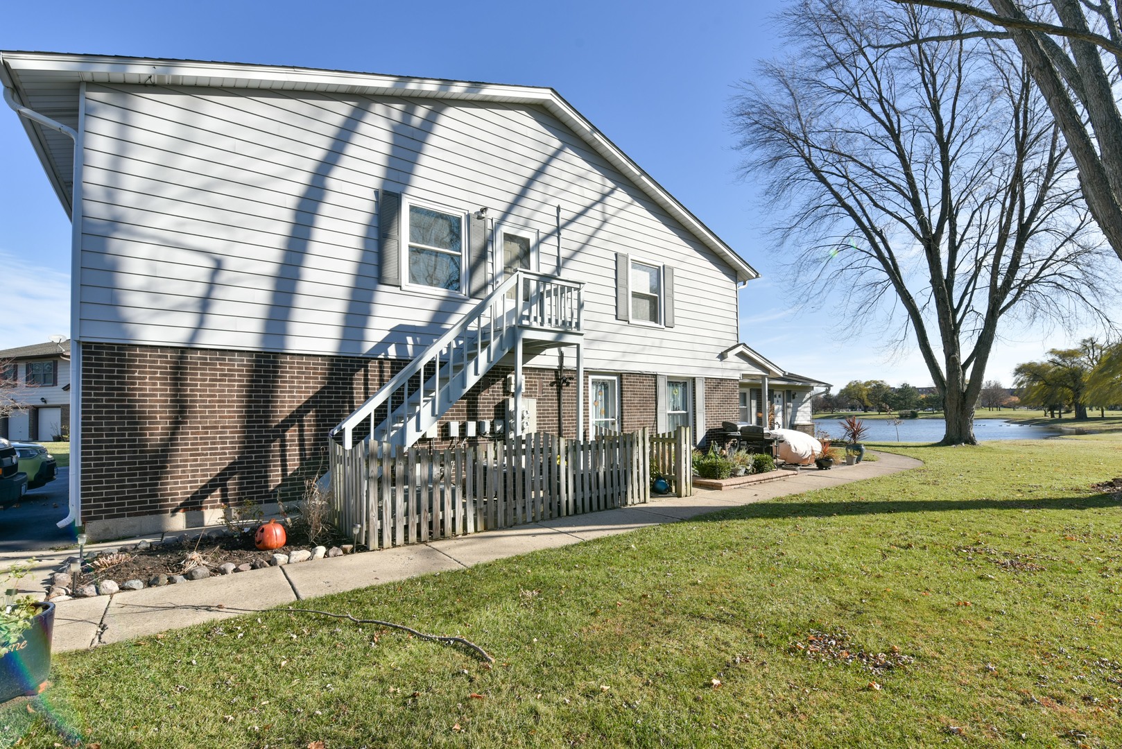 787 Pahl Road, Unit 787 Elk Grove Village, IL 60007 - Photo 27 of 28 a view of a house with a yard