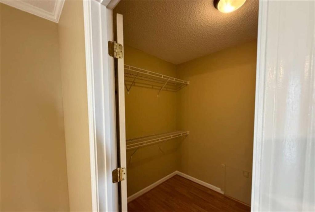 153 Crest Pointe Bremen, GA 30110 - Photo 16 of 24 a bathroom with a wooden door