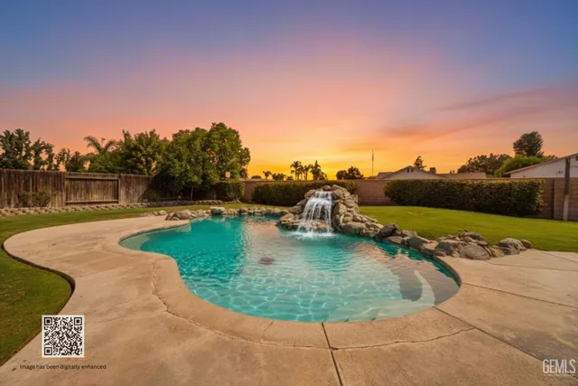 a view of a swimming pool with a lake view