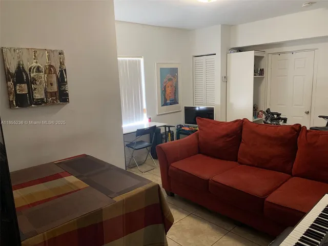 a living room with furniture and a couch