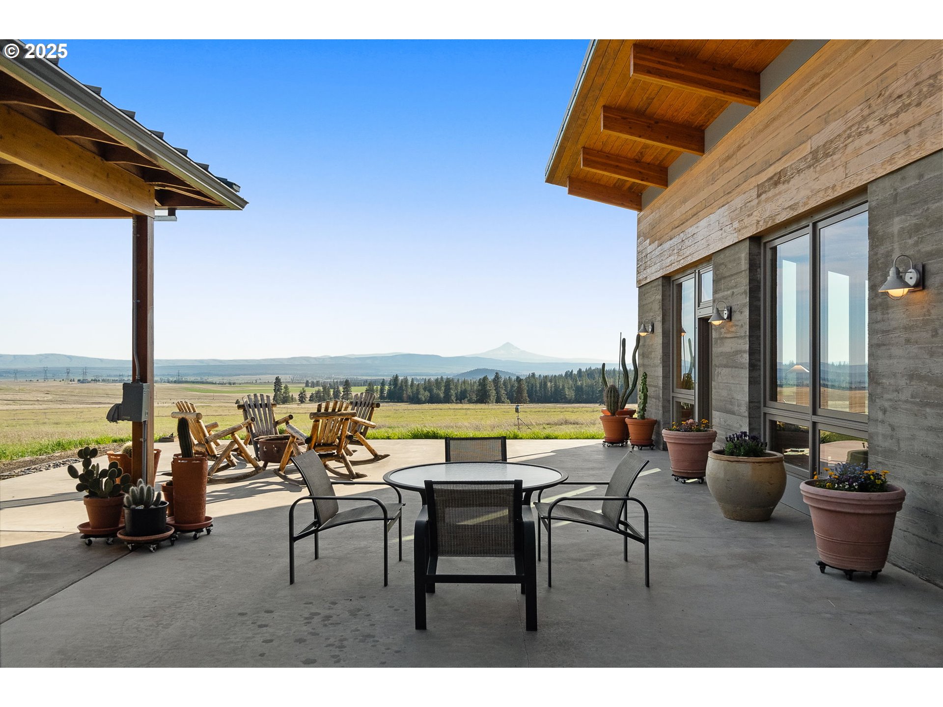 505 Knight Road Goldendale, WA 98620 - Photo 2 of 41 a view of a outdoor seating area with furniture and floor to ceiling window