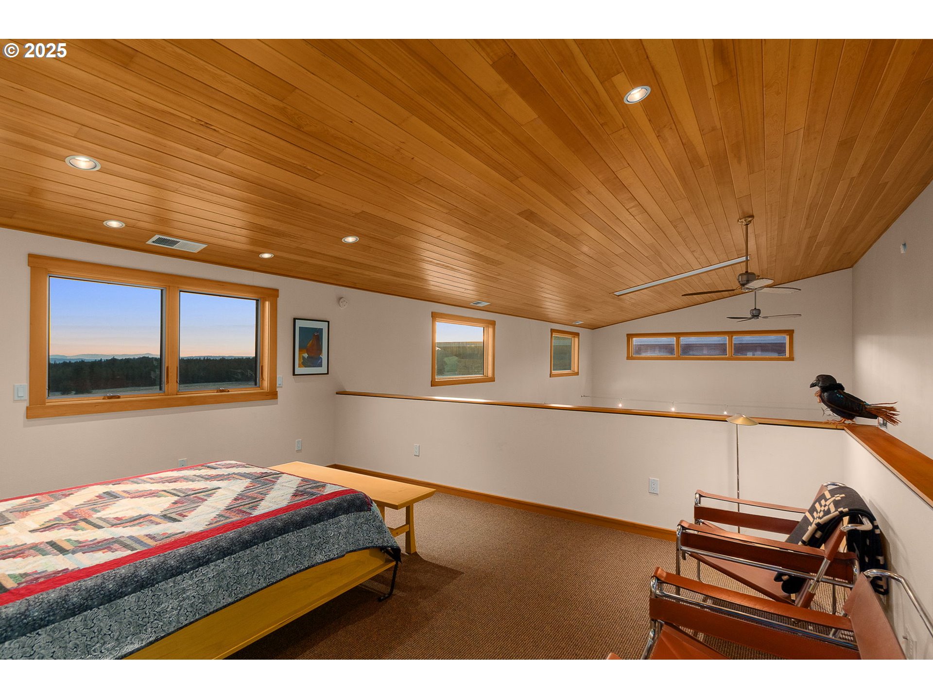 505 Knight Road Goldendale, WA 98620 - Photo 25 of 41 a bedroom with a bed and wooden floor