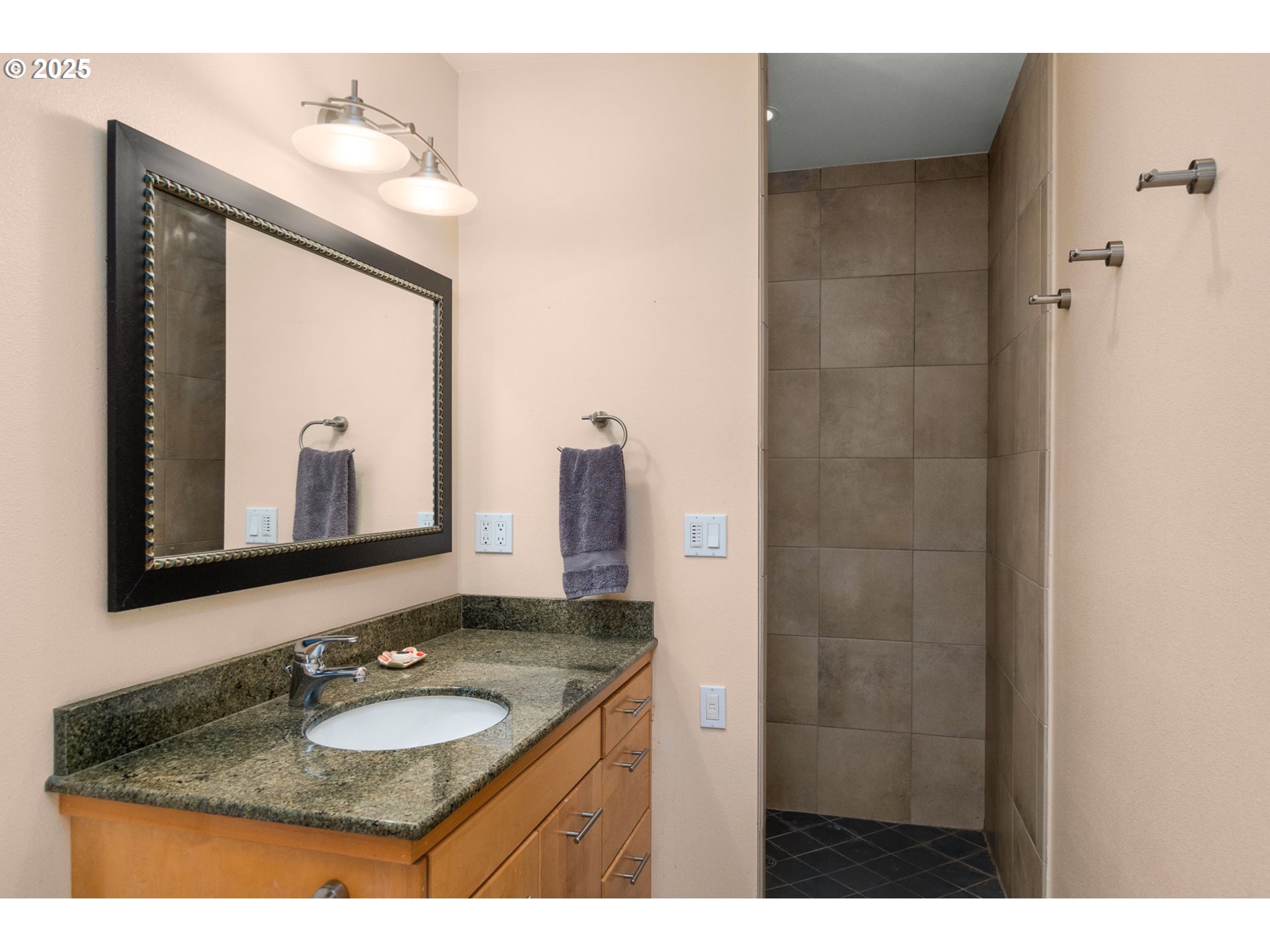 505 Knight Road Goldendale, WA 98620 - Photo 26 of 41 a bathroom with a granite countertop sink and a mirror