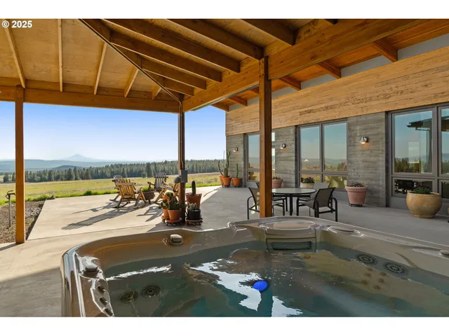 a view of a patio with swimming pool