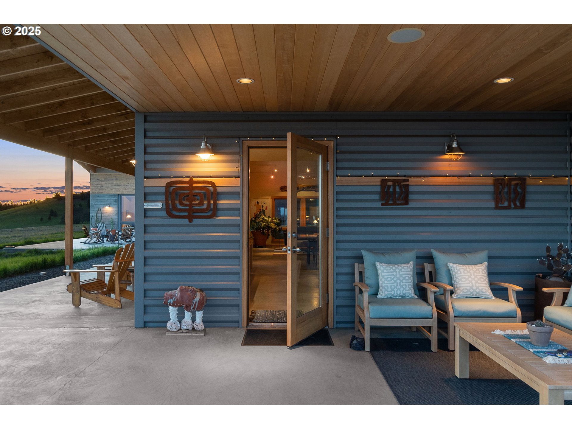 505 Knight Road Goldendale, WA 98620 - Photo 5 of 41 a view of a patio with table and chairs and a barbeque