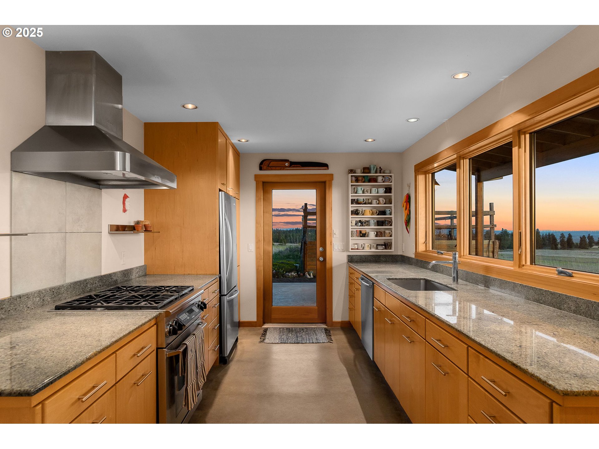 505 Knight Road Goldendale, WA 98620 - Photo 6 of 41 a kitchen with stainless steel appliances granite countertop a stove a sink and a refrigerator