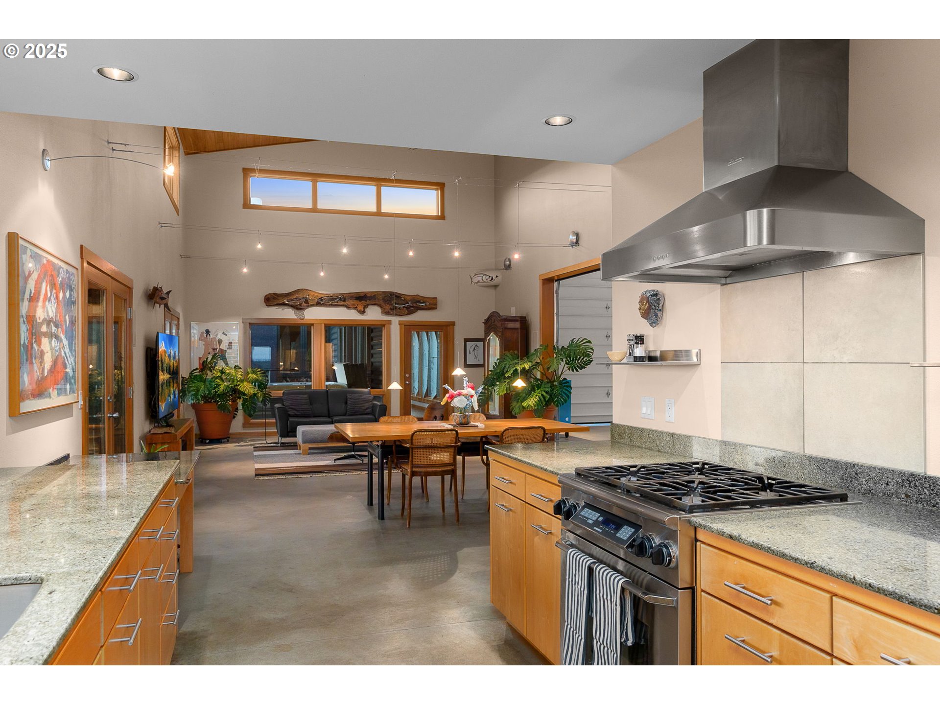 505 Knight Road Goldendale, WA 98620 - Photo 7 of 41 a kitchen with stainless steel appliances granite countertop a stove and a view of living room