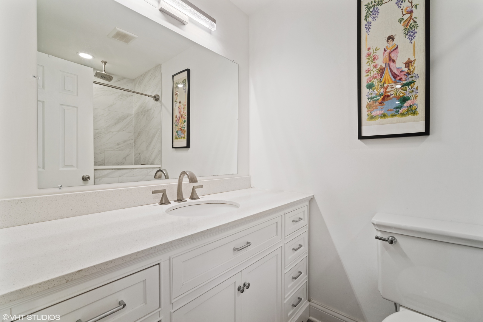 320 Sheridan Drive, Unit 2C Willowbrook, IL 60527 - Photo 13 of 20 a bathroom with a granite countertop sink mirror and vanity