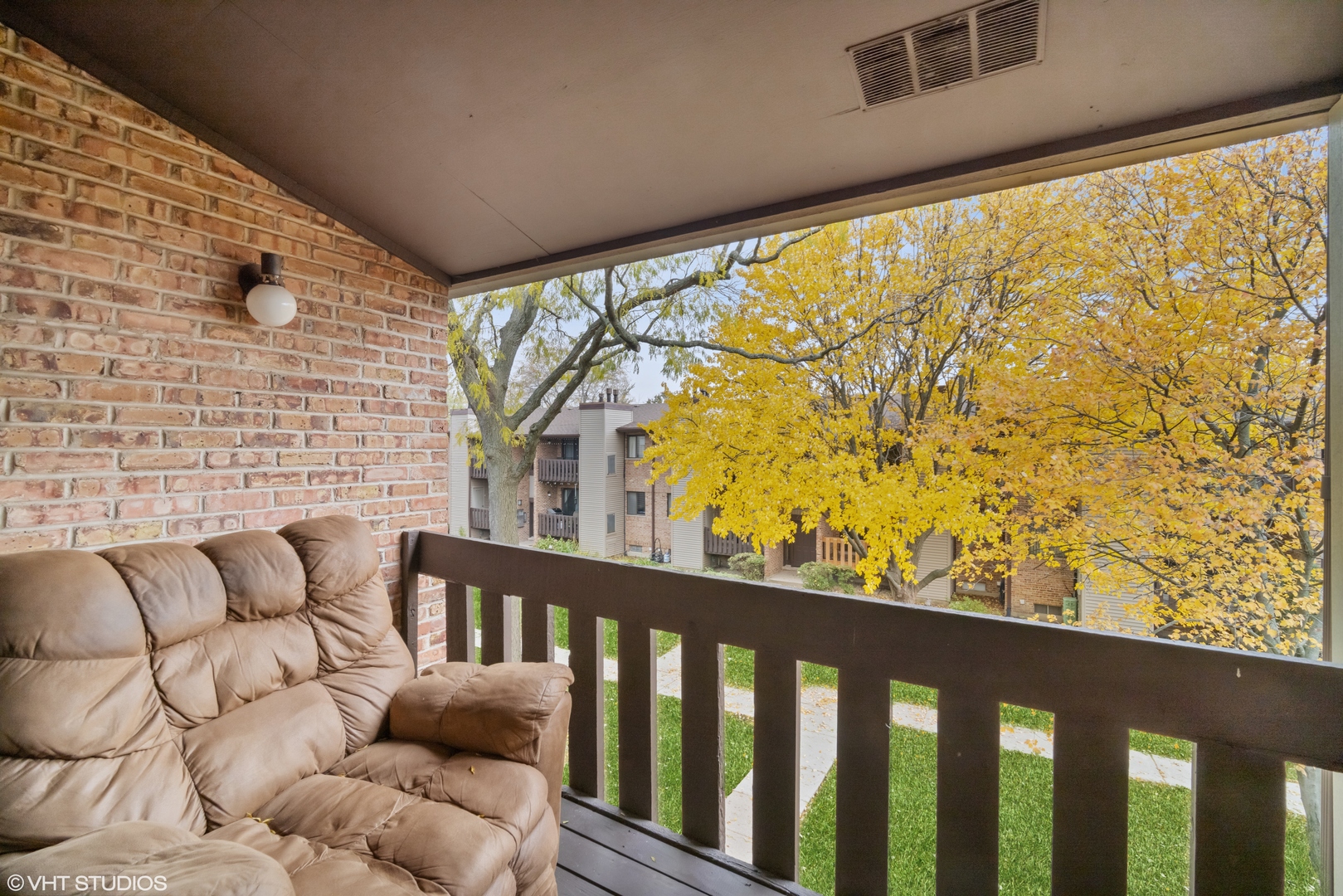 320 Sheridan Drive, Unit 2C Willowbrook, IL 60527 - Photo 14 of 20 a balcony view with large trees