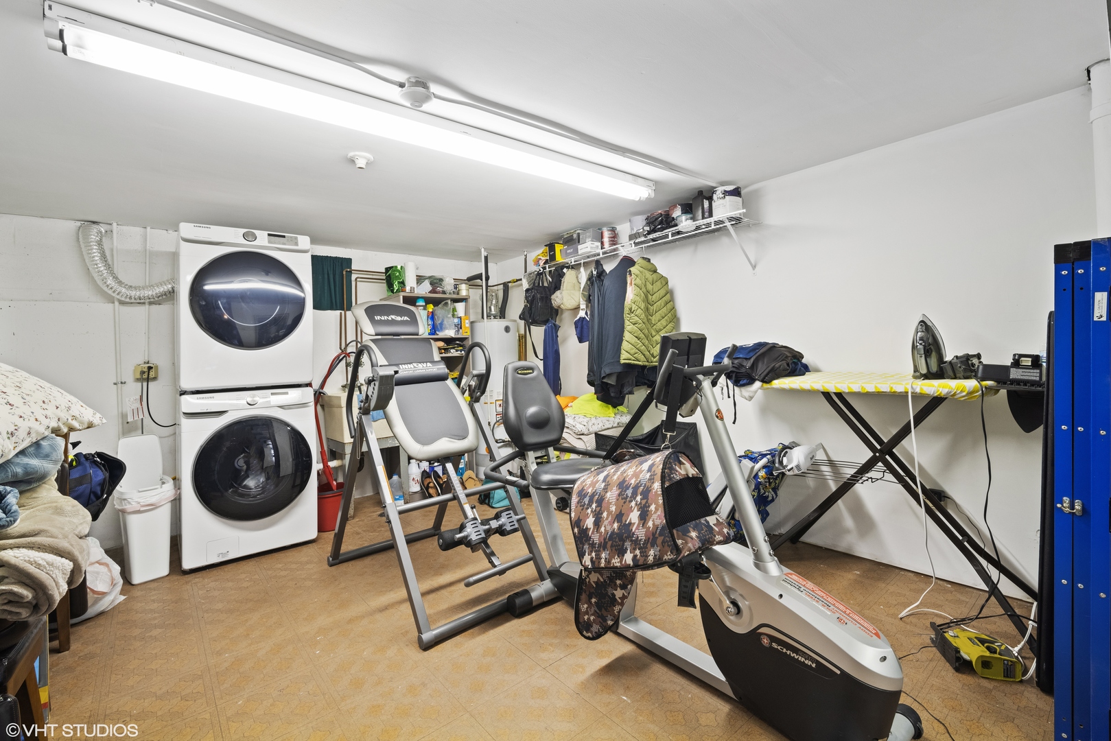 320 Sheridan Drive, Unit 2C Willowbrook, IL 60527 - Photo 16 of 20 a view of a storage and utility room with washer and dryer