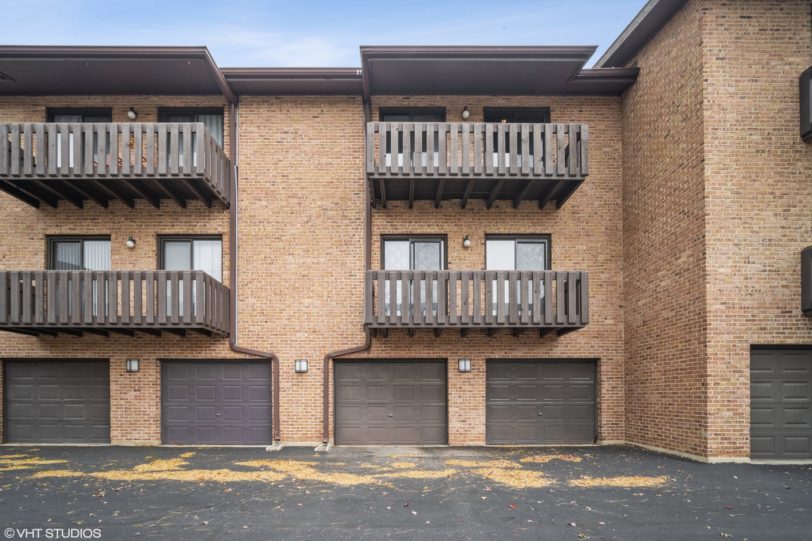 320 Sheridan Drive, Unit 2C Willowbrook, IL 60527 - Photo 18 of 20 a front view of a house with porch