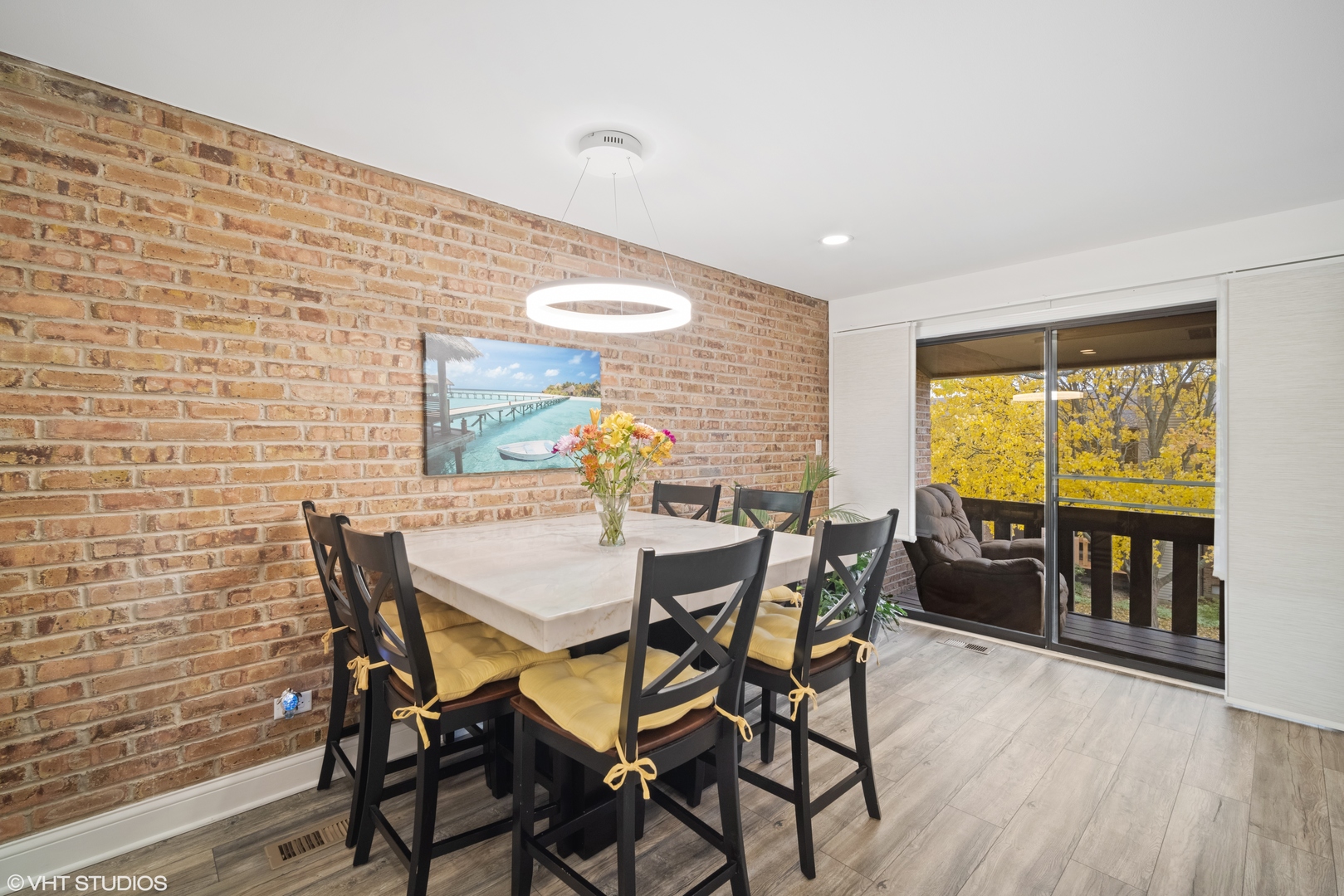 320 Sheridan Drive, Unit 2C Willowbrook, IL 60527 - Photo 3 of 20 a view of a dining room with furniture and wooden floor