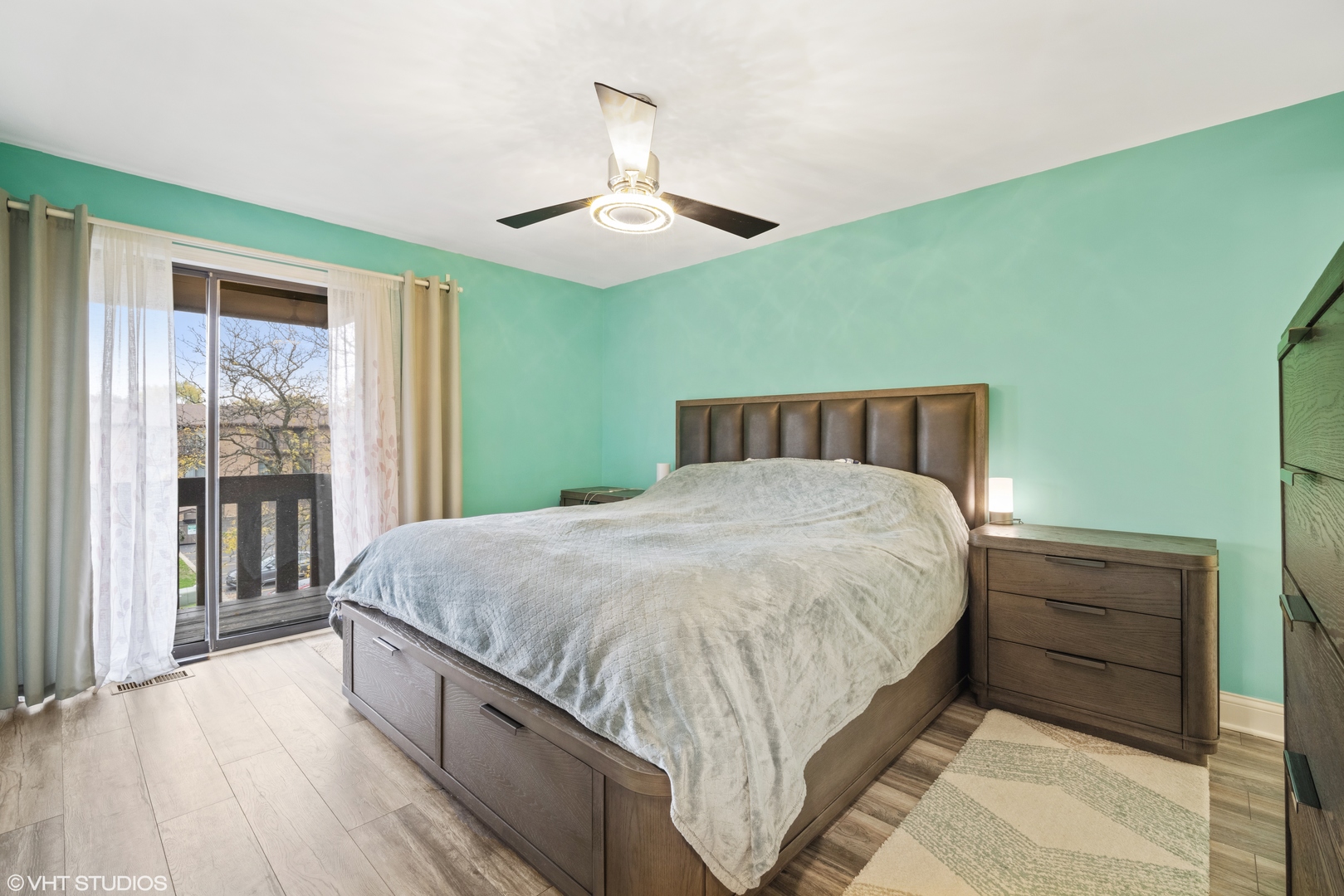 320 Sheridan Drive, Unit 2C Willowbrook, IL 60527 - Photo 9 of 20 a bed sitting in a spacious bedroom next to a window