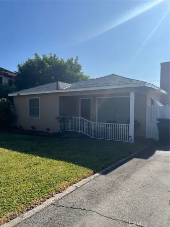 a view of a backyard with a garden