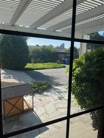 a view of a lot of a yard from a window