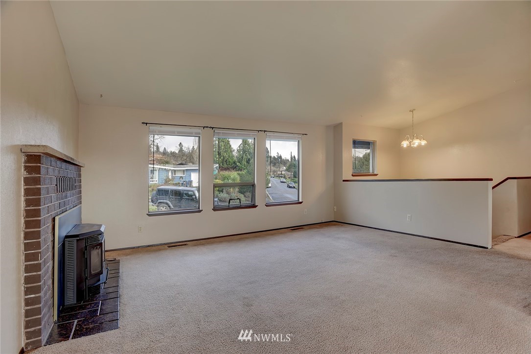 2801 Sierra Road Bremerton, WA 98310 - Photo 2 of 23 an empty room with windows