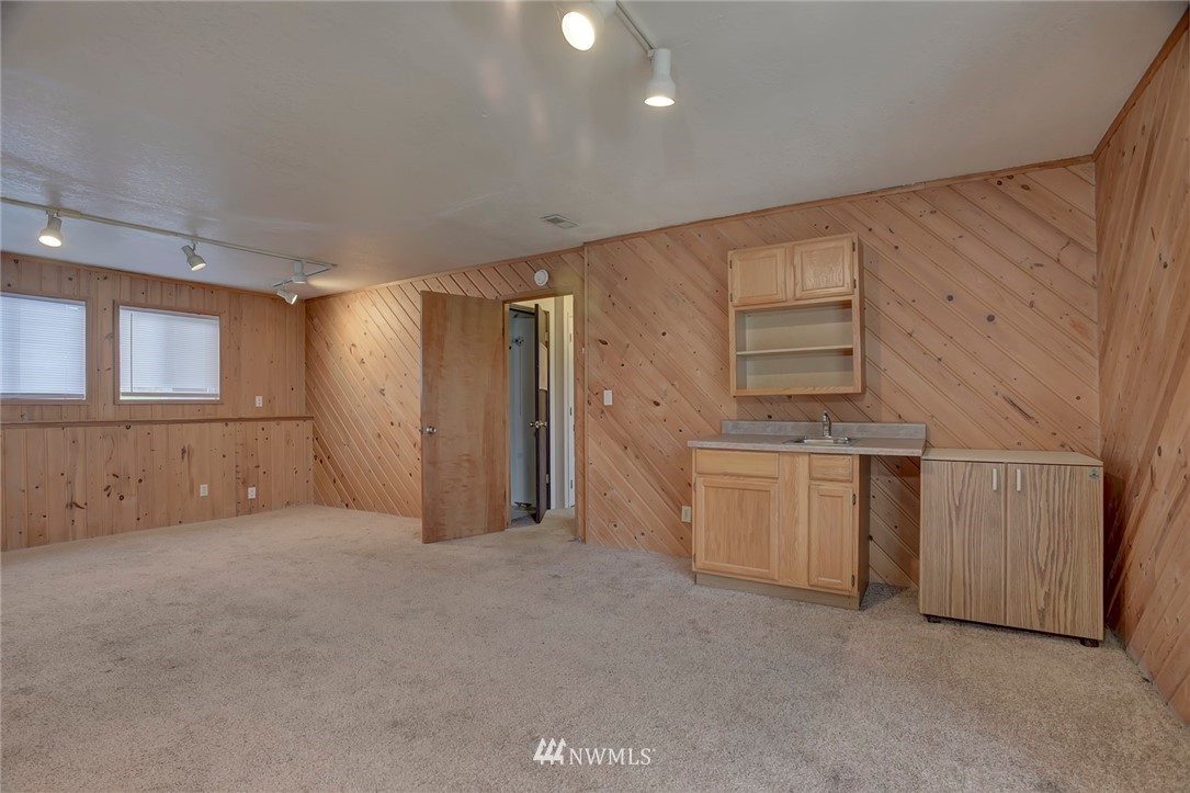 2801 Sierra Road Bremerton, WA 98310 - Photo 18 of 23 a view of an empty room with a kitchen