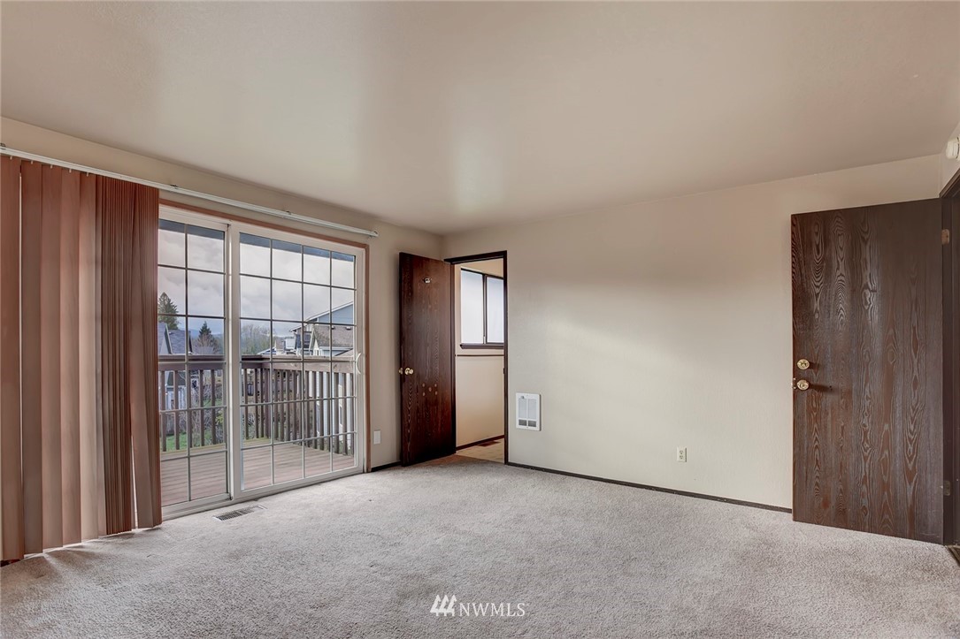 2801 Sierra Road Bremerton, WA 98310 - Photo 8 of 23 a view of an empty room with glass door